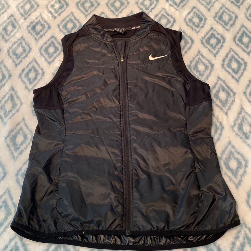 NIKE black vest size Medium, will fit a large